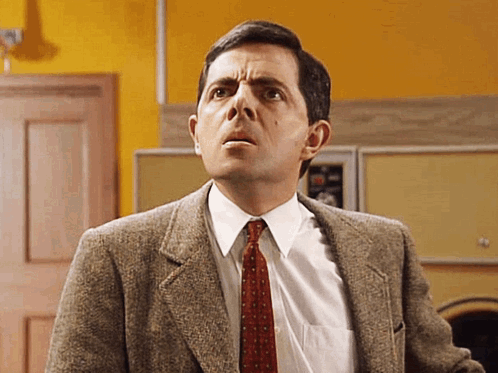 Man In Suit Looking Up GIF