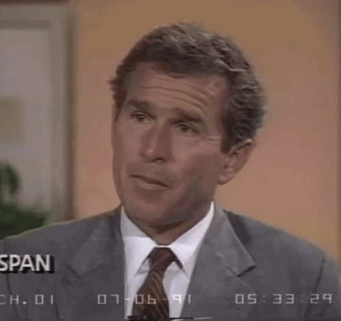 Man in Suit Making Face