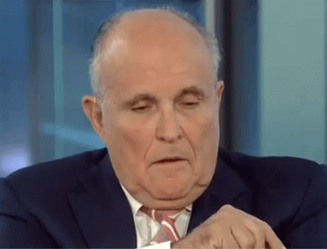 Man in Suit Making Face