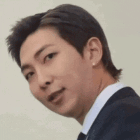 Man in Suit Making Face