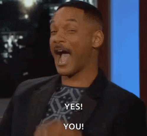 Man in Suit Making Face Saying Yes