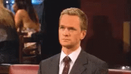 Man In Suit Making Funny Face GIF