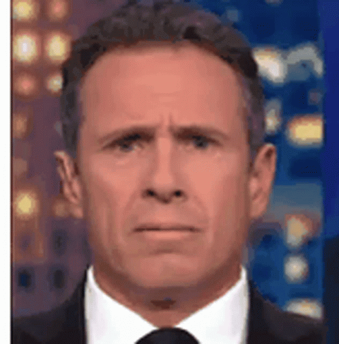 Man In Suit Making Funny Face GIF