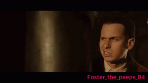 Man In Suit Making Funny Face GIF