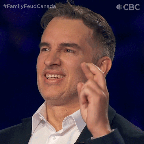Man In Suit Making Funny Face GIF