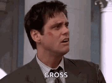 Man in Suit Making Funny Face Gross