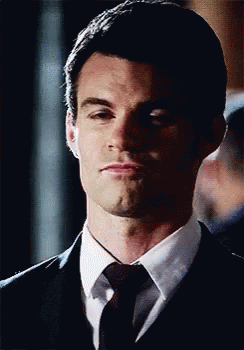 Man In Suit Making Funny Face GIF
