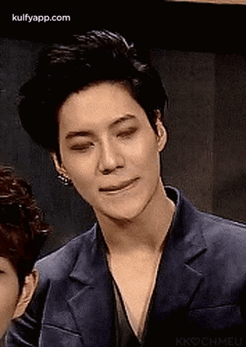 Man In Suit Making Funny Face Next To Another Man GIF