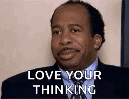 Man in Suit Making Funny Face Saying Love Your Thinking