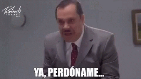 Man in Suit Making Funny Face Saying Ya Perdoname