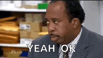 Man in Suit Making Funny Face Saying Yeah Ok