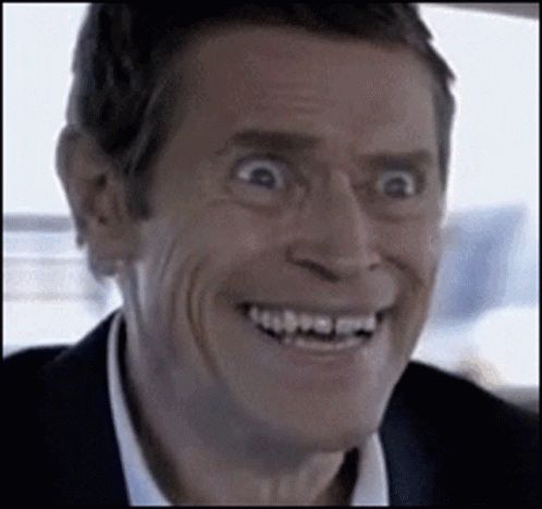 Man in Suit Making Funny Face Smiling
