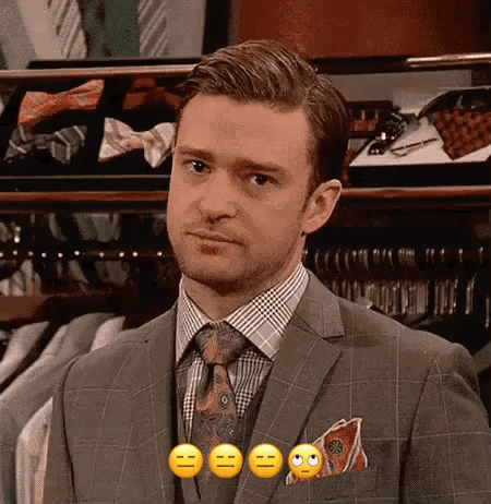 Man In Suit Making Funny Face GIF