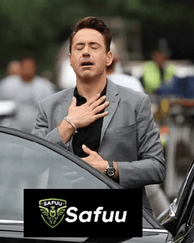 Man in Suit Next to Car Hand on Chest Safuu Logo