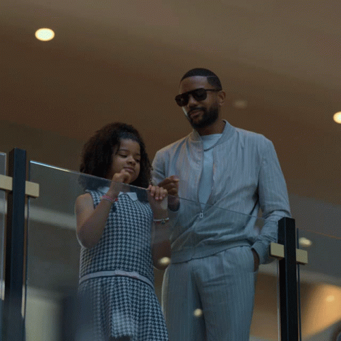 Man In Suit Next To Little Girl In Dress GIF