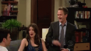 Man In Suit Next To Woman In Blue Tank Top And Man In White Shirt GIF