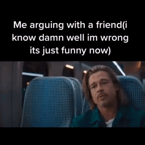 Man in Suit on Plane Saying Me Arguing With a Friend