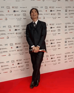 Man in Suit on Red Carpet Wall Ifta