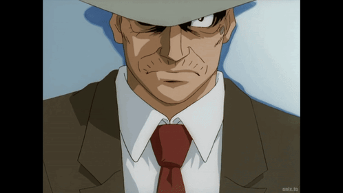 Man In Suit On Screen Saying Anix.to GIF