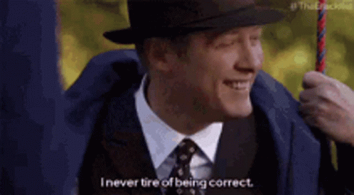 Man In Suit On Swing Says I Never Tire Of Being Correct GIF