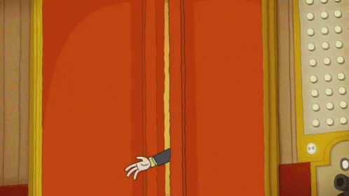 Man In Suit Peeking Out Of Elevator Door GIF