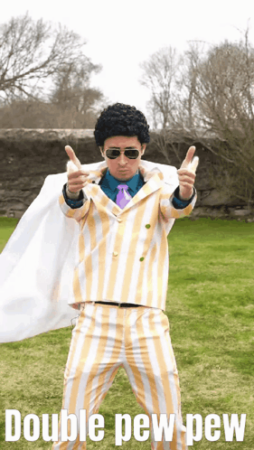 Man in Suit Pointing and Saying Pew Pew Pew