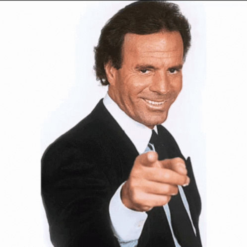 Man in Suit Pointing at Camera Eso No Pasara