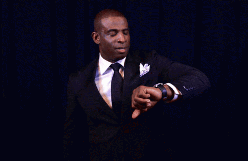 Man In Suit Pointing At Watch GIF