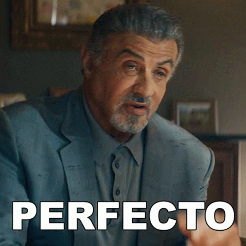 Man in Suit Pointing Saying Perfecto
