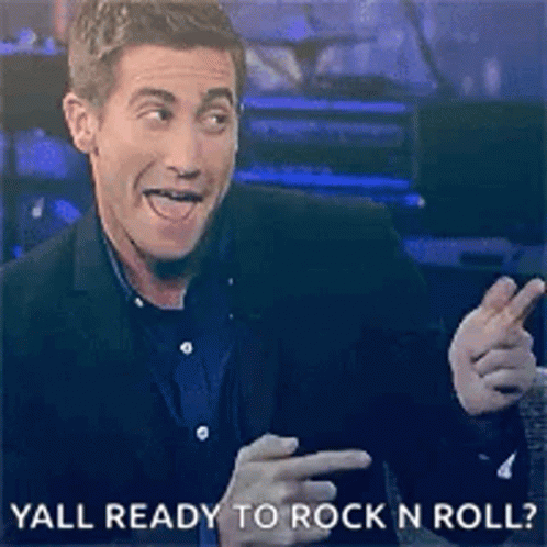 Man in Suit Pointing Yall Ready to Rock N Roll
