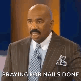 Man In Suit Praying During TV Show GIF