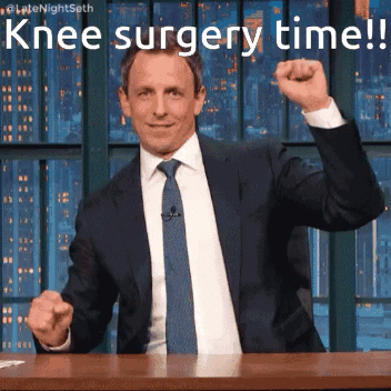 Man In Suit Pumping Fist Knee Surgery Time GIF