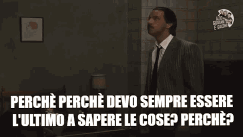 Man In Suit Raising Arms Saying Perche Perche Devo Sempre Essere GIF