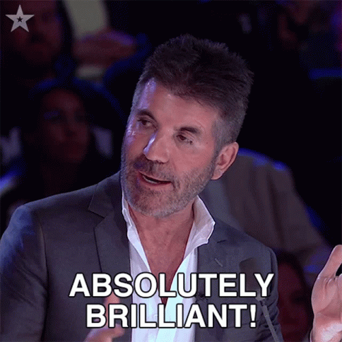 Man in Suit Saying Absolutely Brilliant