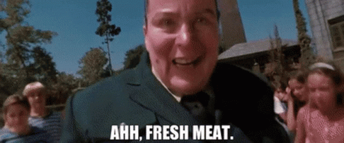 Man in Suit Saying Ahh Fresh Meat