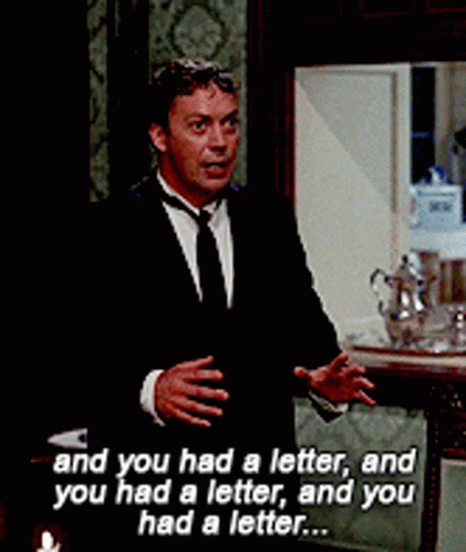 Man in Suit Saying And You Had A Letter
