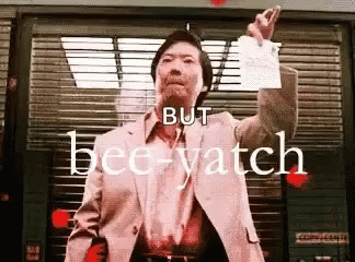 Man In Suit Saying Bee-Yatch GIF