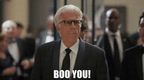Man in Suit Saying Boo You in Crowd