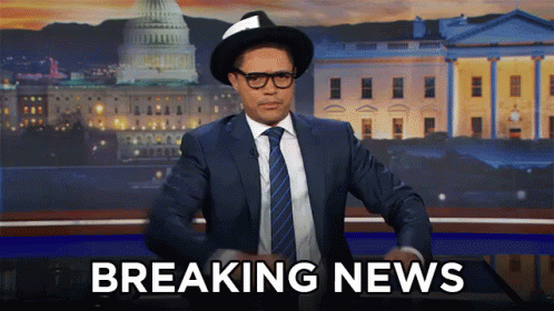 Man In Suit Saying Breaking News At Capitol GIF