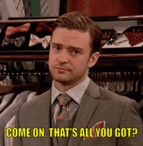 Man in Suit Saying Come On Thats All You Got