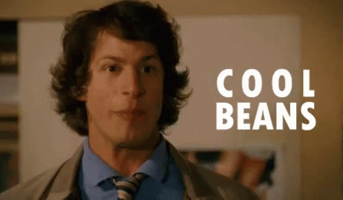Man in Suit Saying Cool Beans