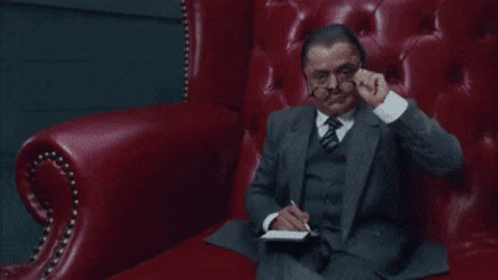 Man in Suit Saying Don't Worry This Is a Safe Place
