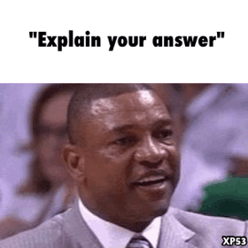 Man in Suit Saying Explain Your Answer