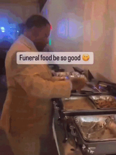 Man In Suit Saying Funeral Food Be So Good GIF