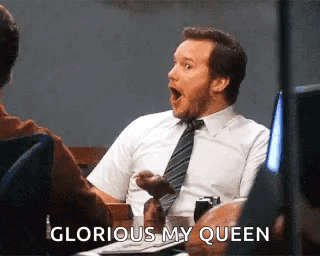 Man in Suit Saying Glorious My Queen