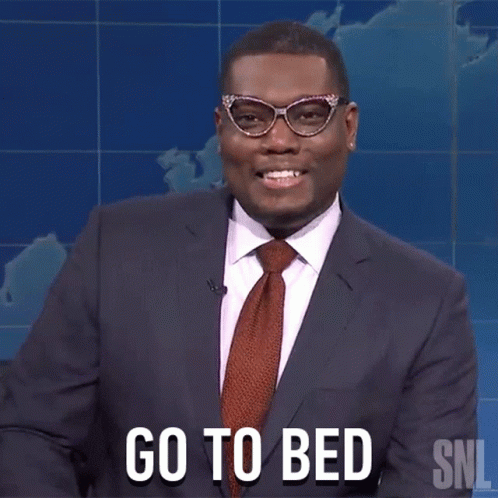 Man in Suit Saying Go to Bed
