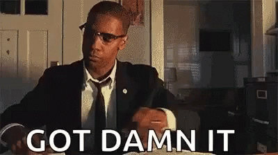 Man in Suit Saying Got Damn It
