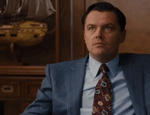 Man in Suit Saying Gota Have You