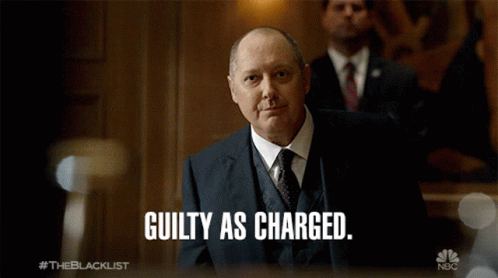 Man In Suit Saying Guilty As Charged GIF