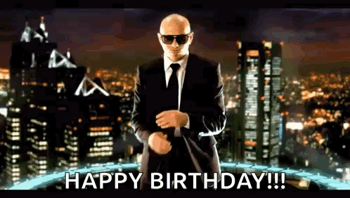 Man in Suit Saying Happy Birthday
